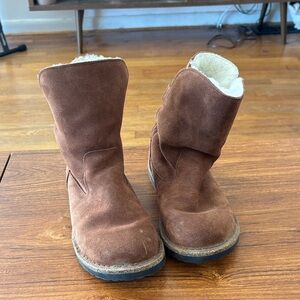 Birkenstock brown suede shearling lined ankle boots.
